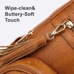 81+oaMikzvL_AC_SL1500_ | Babyz Corner Close-up of a brown leather boot showing a gold zipper and fringe tassel detail