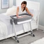 Simmons Kids By The Bed City Sleeper Bassinet - Adjustable Height Portable Crib with Wheels Airflow Mesh Grey Tweed | Babyz Corner Simmons Kids By The Bed City Sleeper Bassinet - Adjustable Height Portable Crib with Wheels & Airflow Mesh, Grey Tweed
